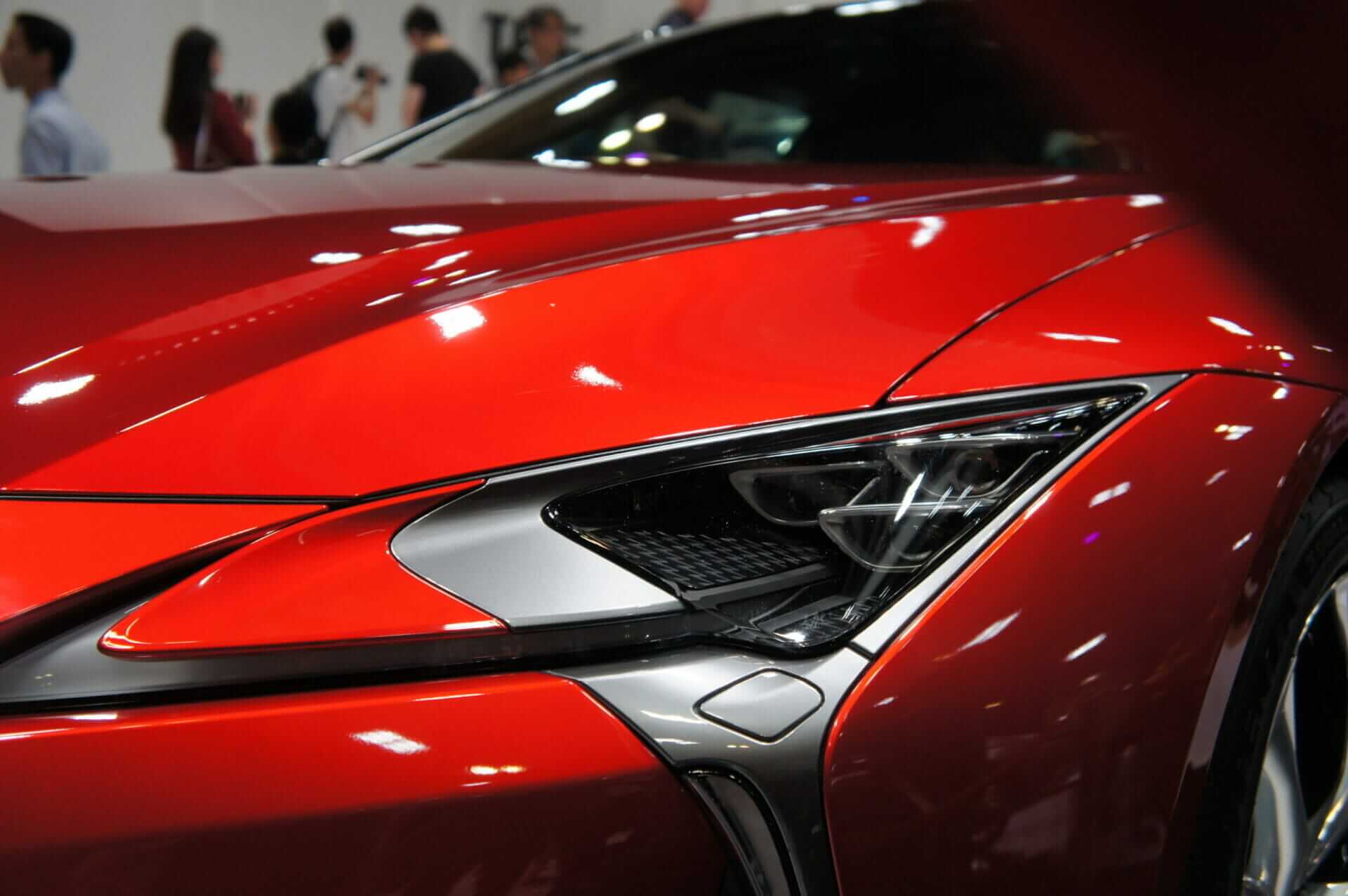 Close up to a shiny red sports car